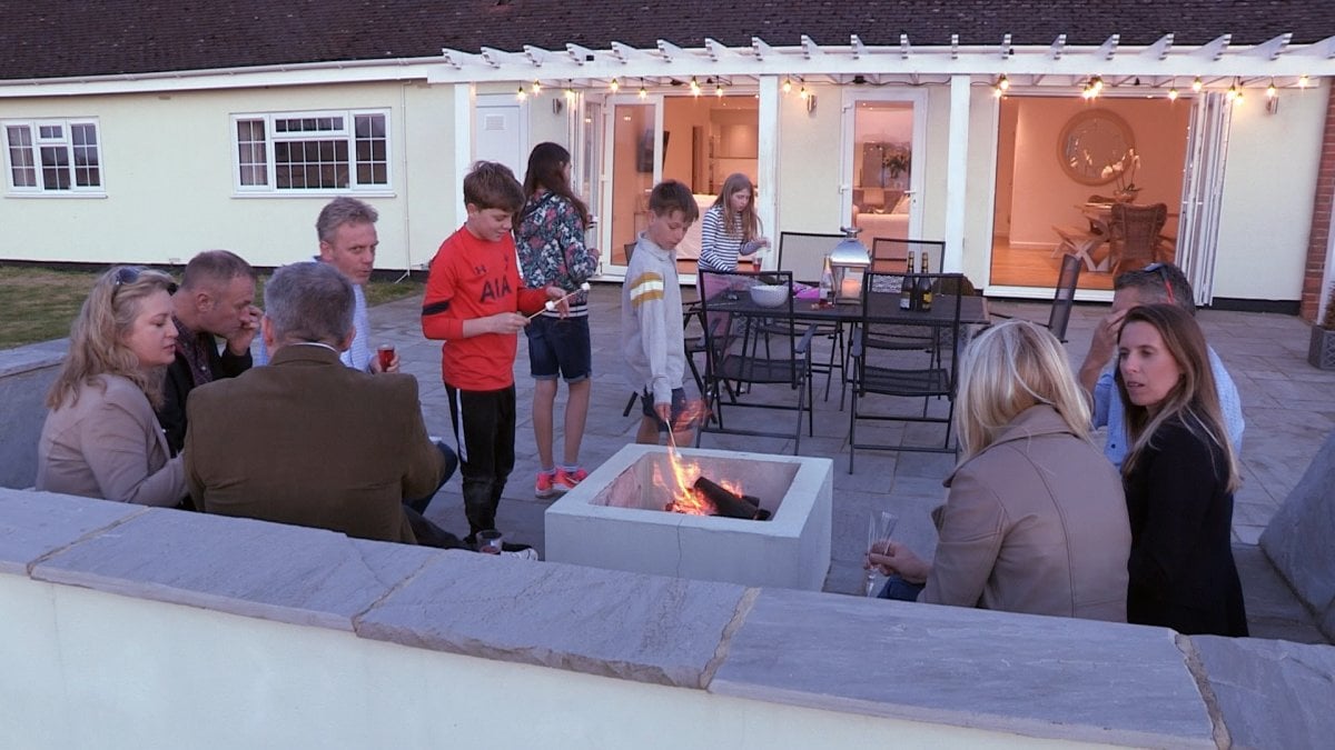 Island Riding Centre - The Orchard toasting marshmallows with the family